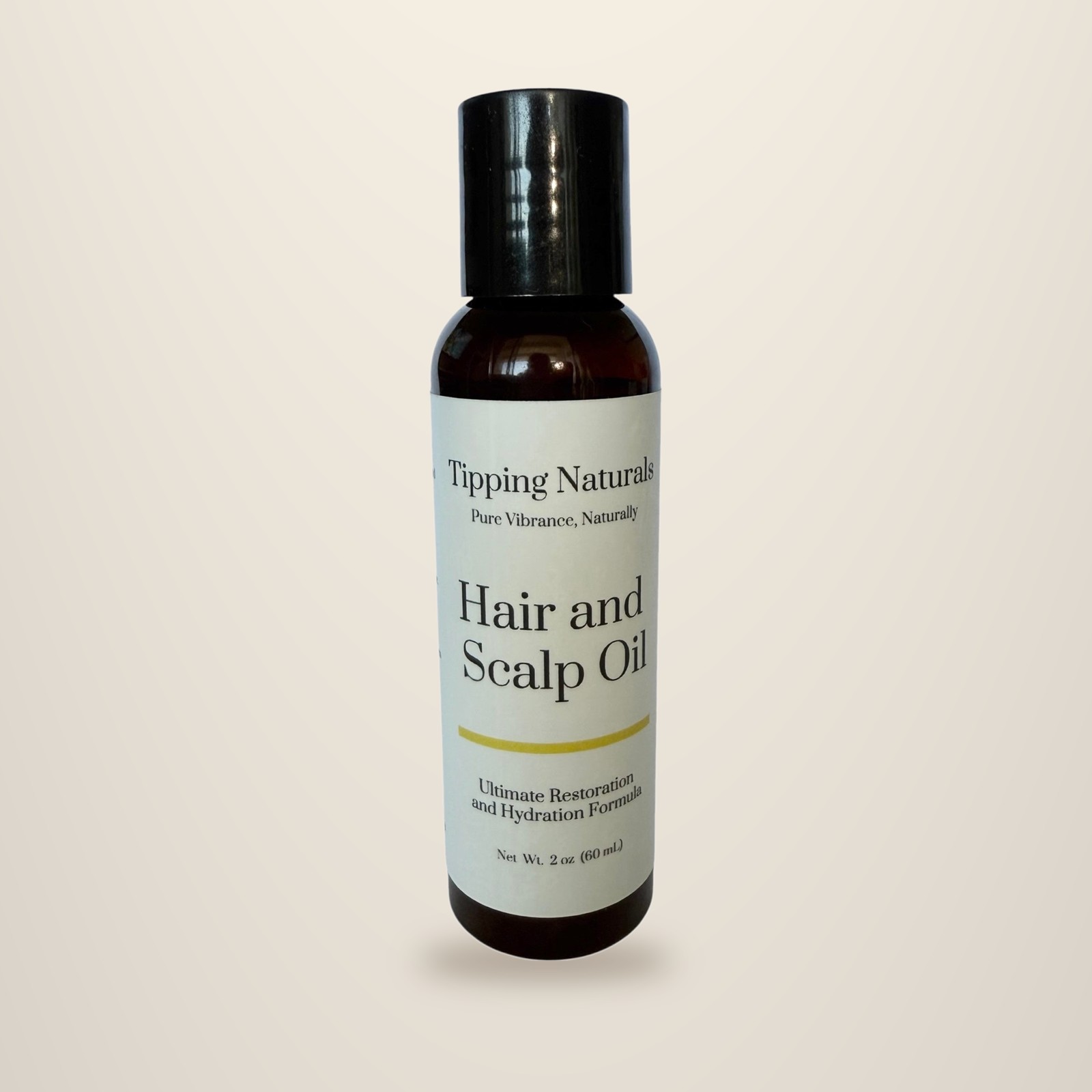 Dropper bottle of Tipping Naturals hair and scalp oil