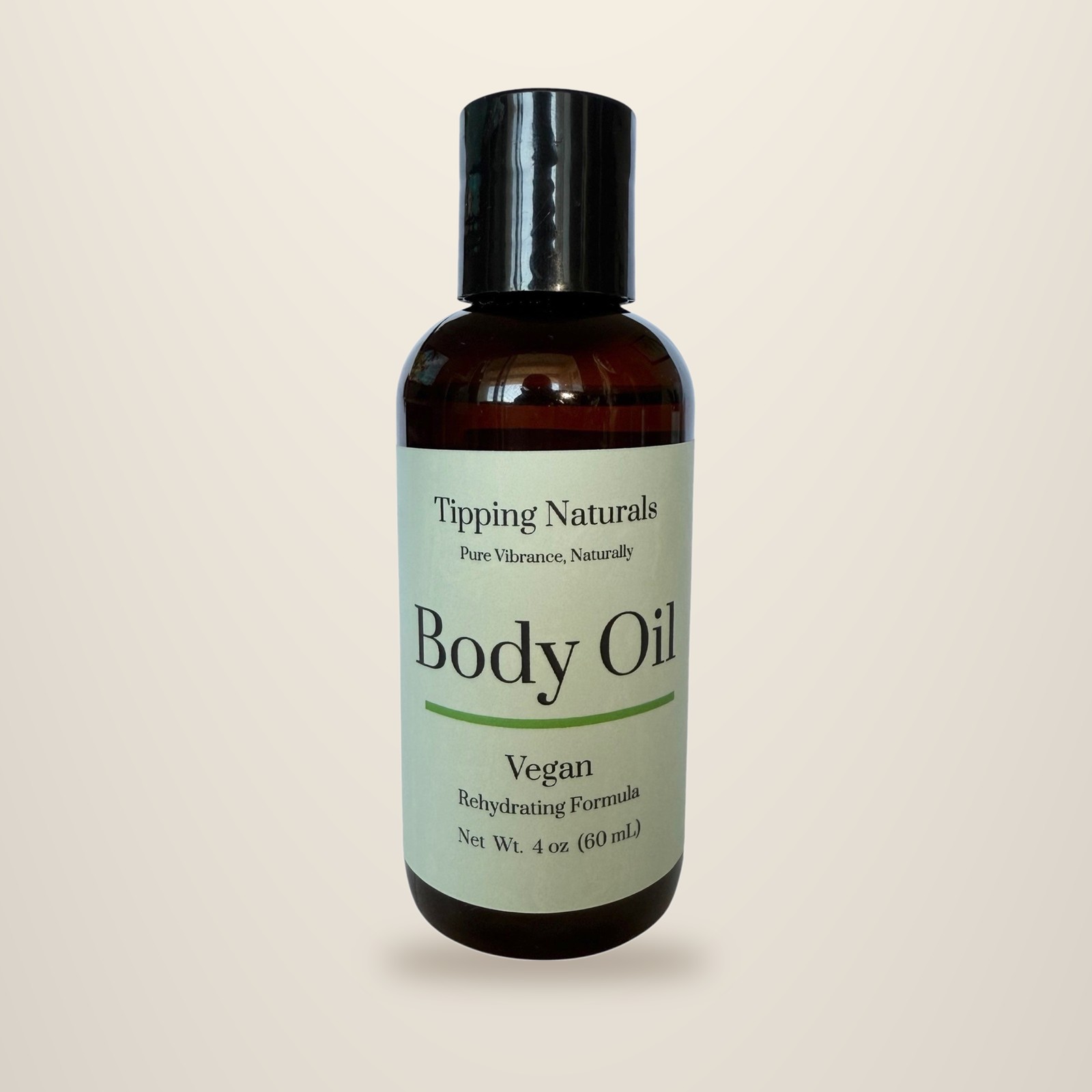 Dropper bottle of Tipping Naturals vegan body oil